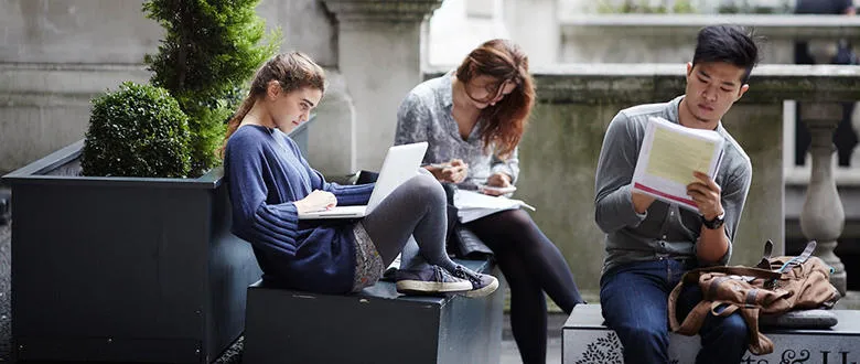 Students studying in the quad at the Strand campus