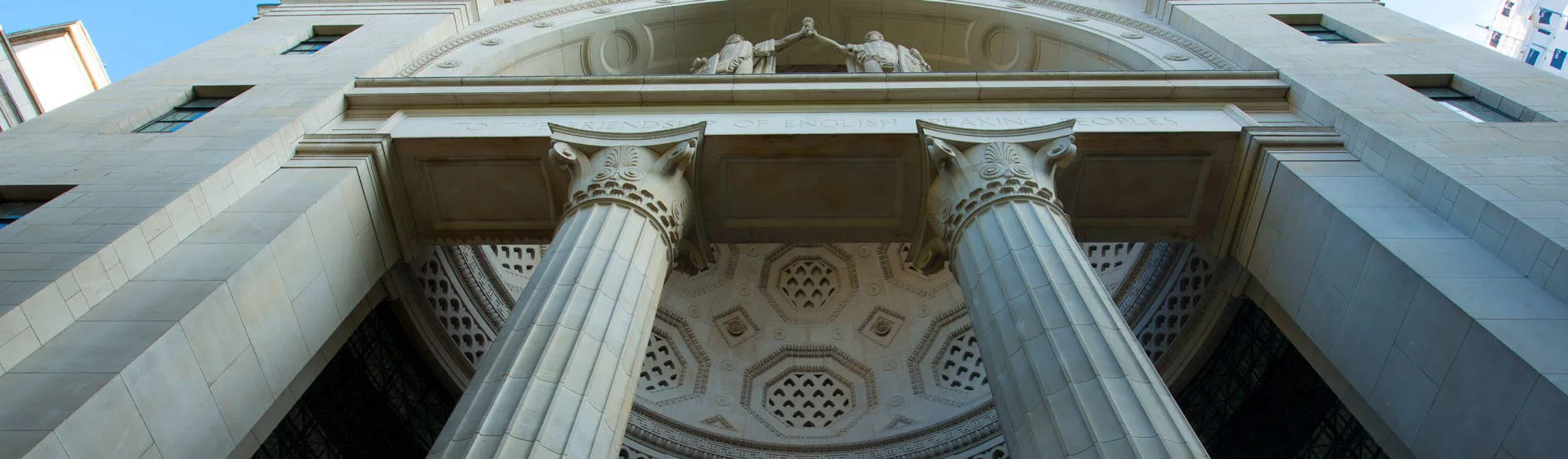The front entrance to Bush House, shot from the ground looking up.