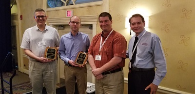 Professor Steven Gilmour (l) receives his award