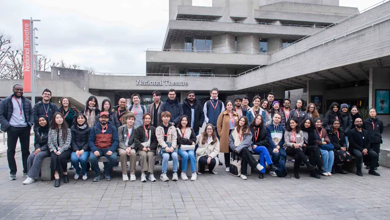 Group of people outside National Theatre in London