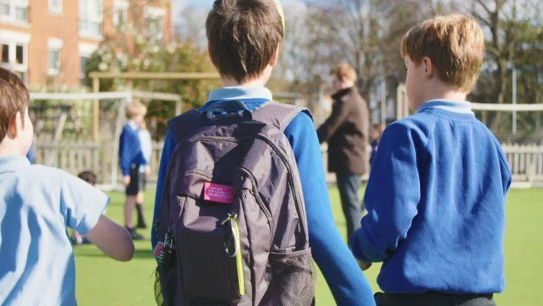 Children with backpacks