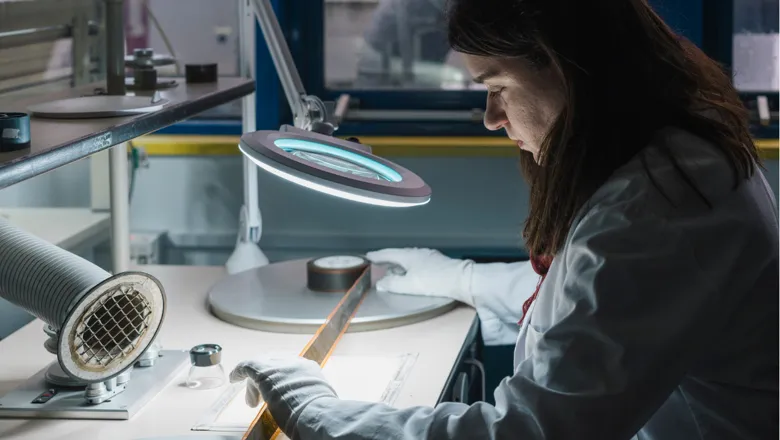 An expert working on restoration and conservation at the BFI National Archive.