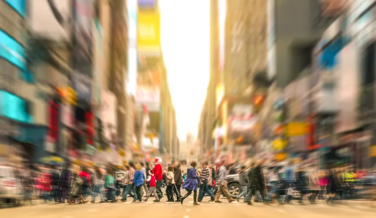 An abstract photograph of a street scene.