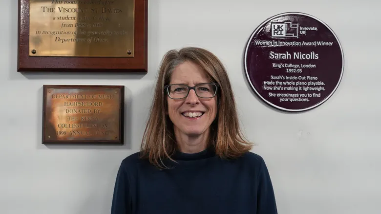 Pianist Sarah Nicolls and a purple plaque in her honour