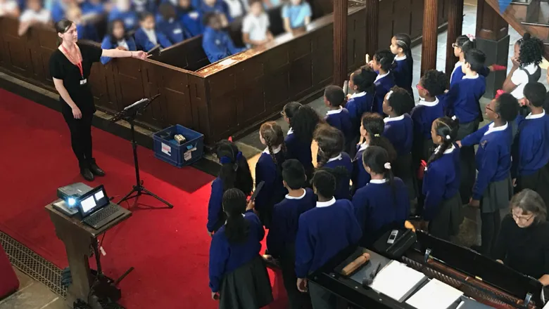 Children singing in the Academy, Southwark