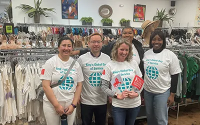 Our alumni in Boston volunteered at a clothing bank