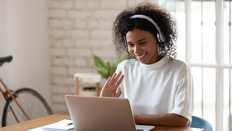 Student chatting on laptop