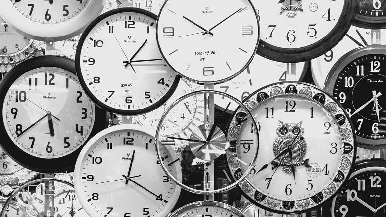 image of clocks in grey