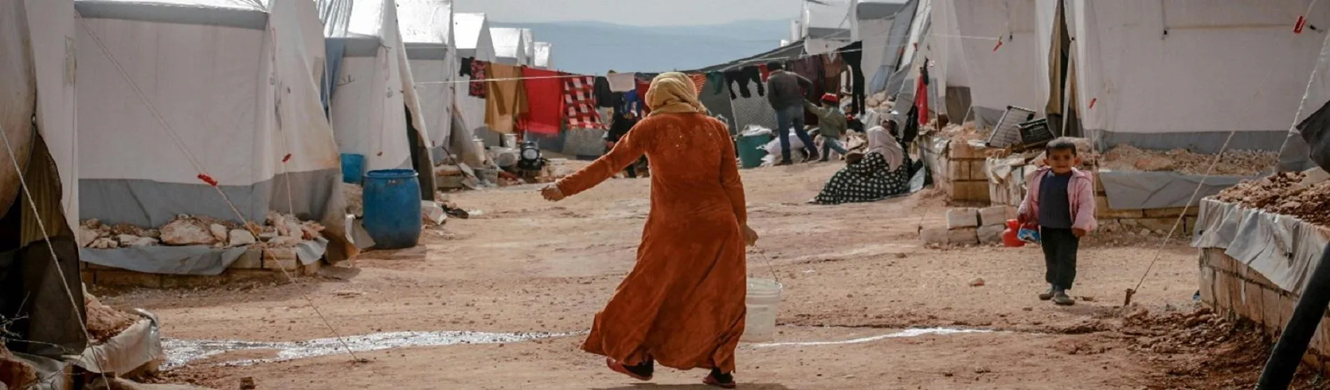 image of a woman in a refugee camp