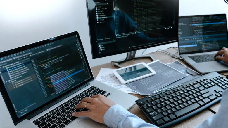 Person working at computer.