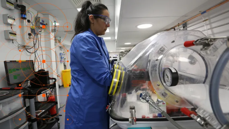 A researcher working in the Cyclotron and Radiochemistry Laboratory at King's College London.