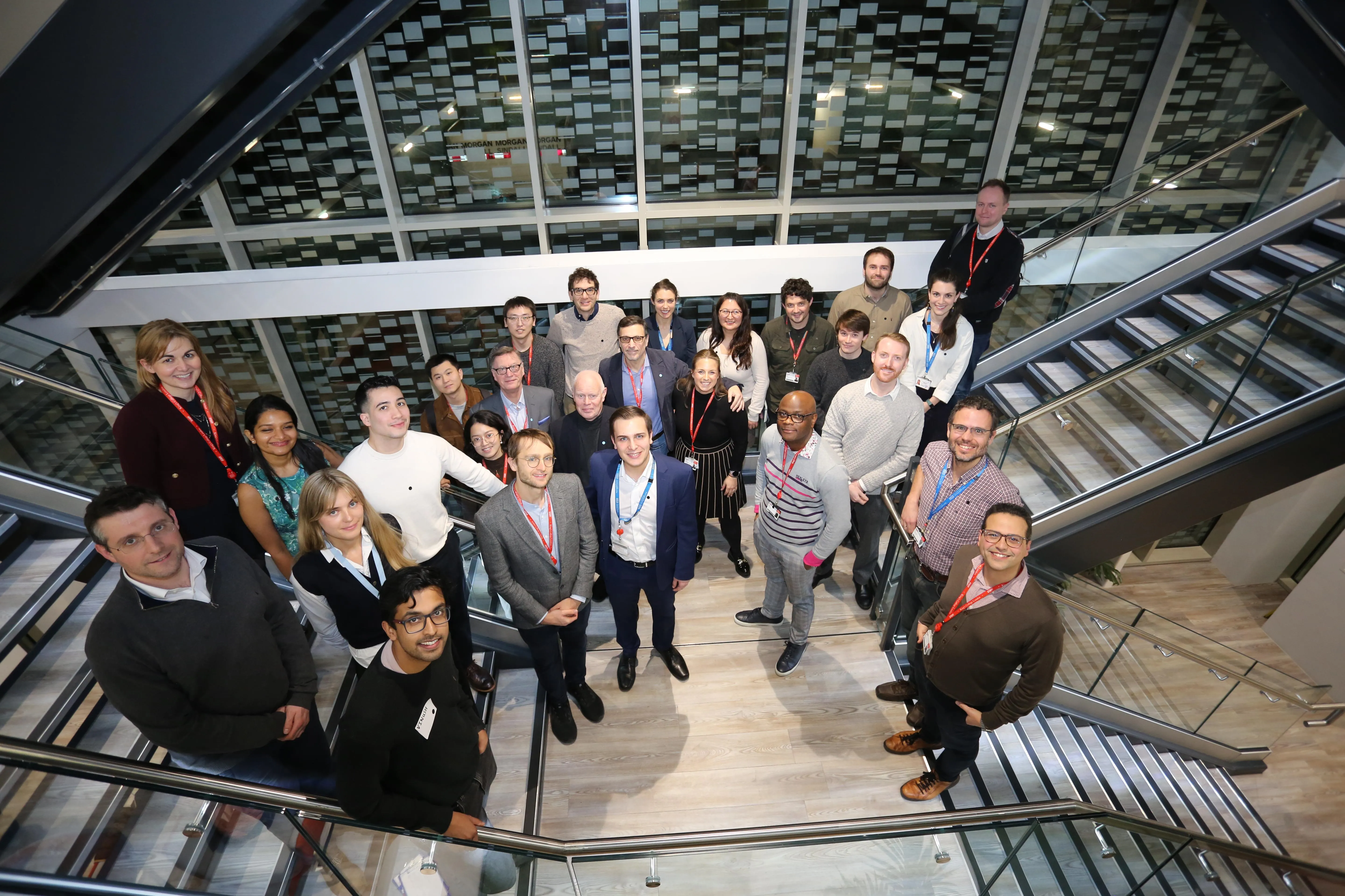 group shot of people standing on stairs