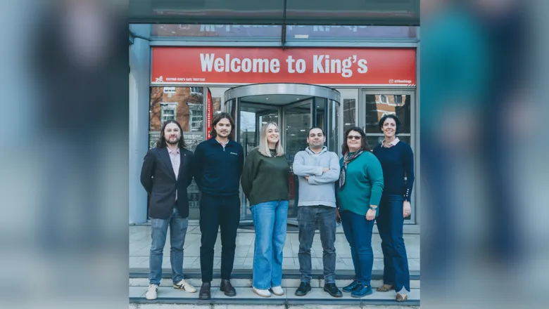 The Prosemble team standing outside a building at King's College London.