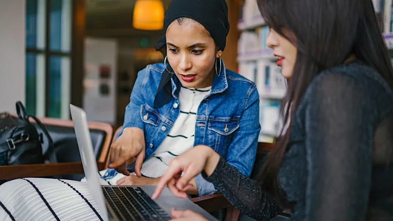 women working on laptop