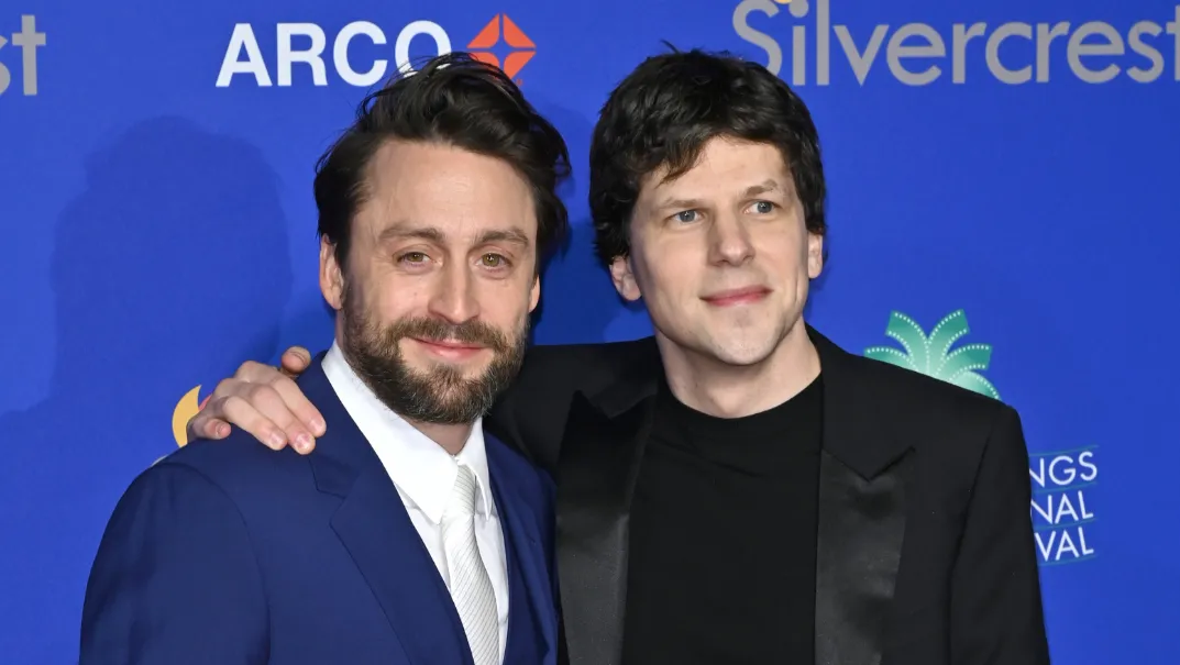 Kieran Culkin and Jesse Eisenberg arriving at the 2025 Palm Springs Film Festival Awards.