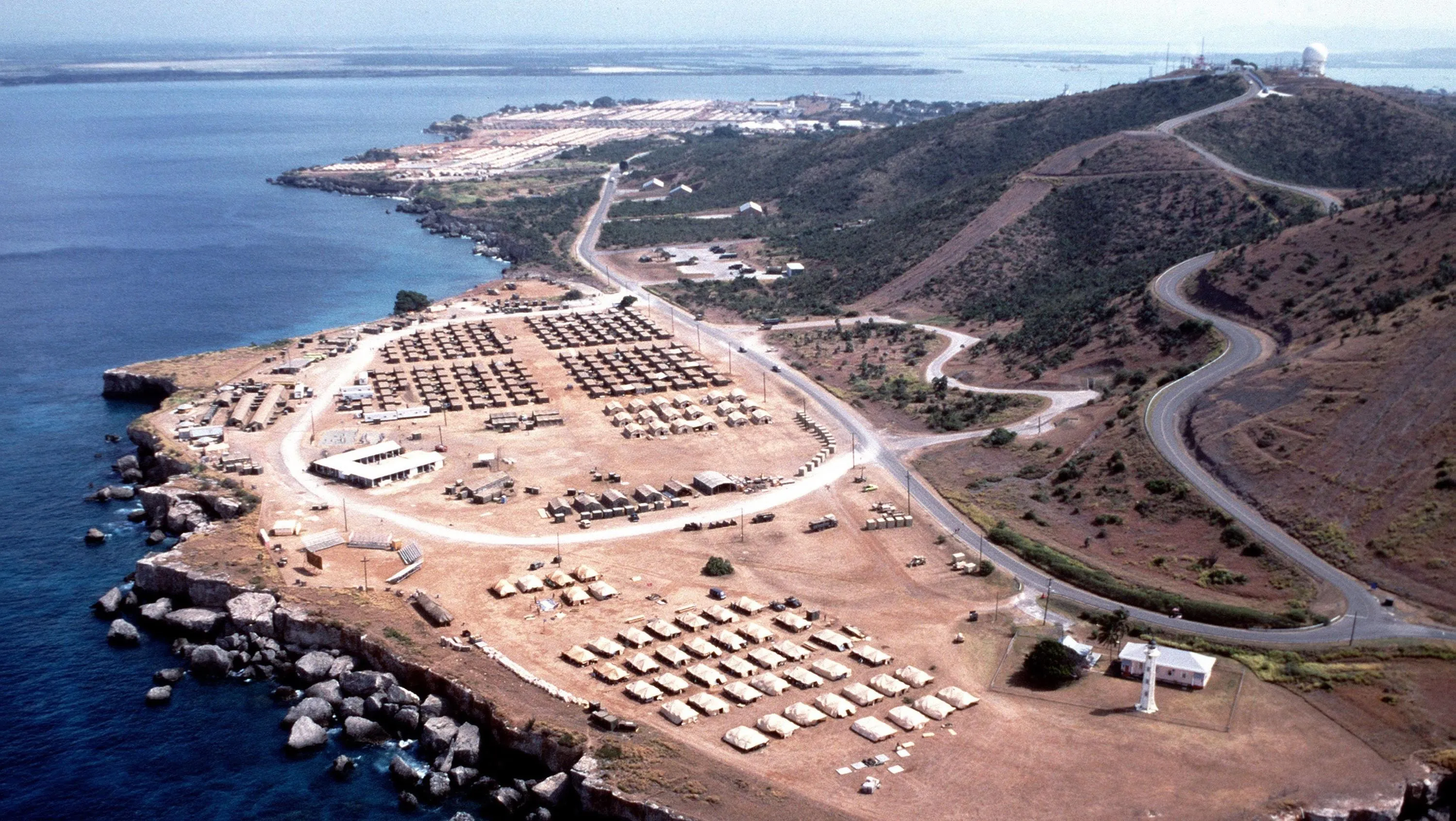 Aerial shot of a headland with sea around