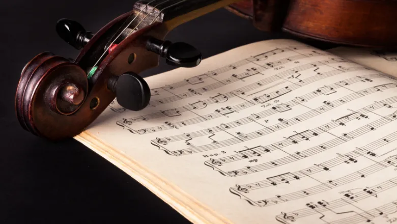 A violin and music sheet