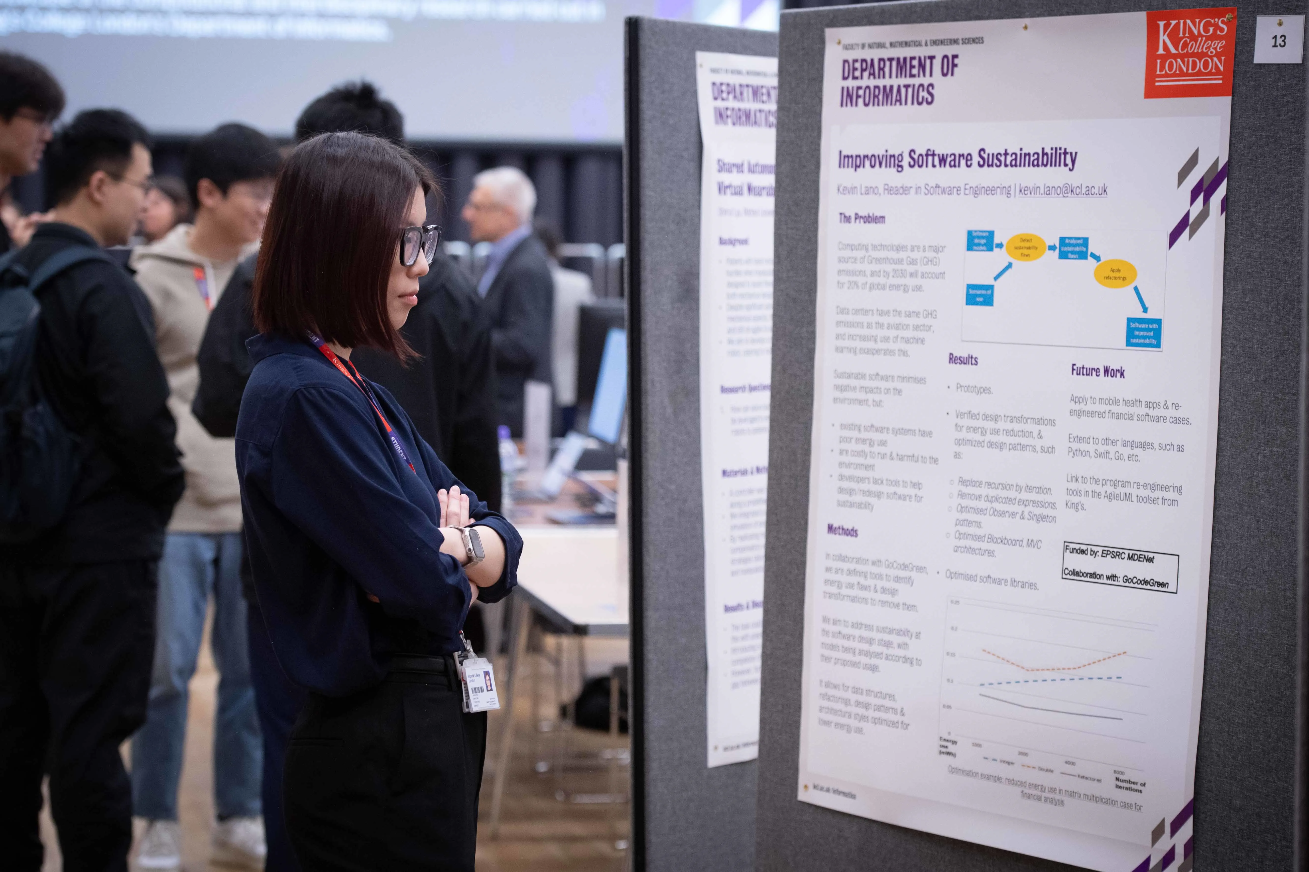 A woman looking at a poster