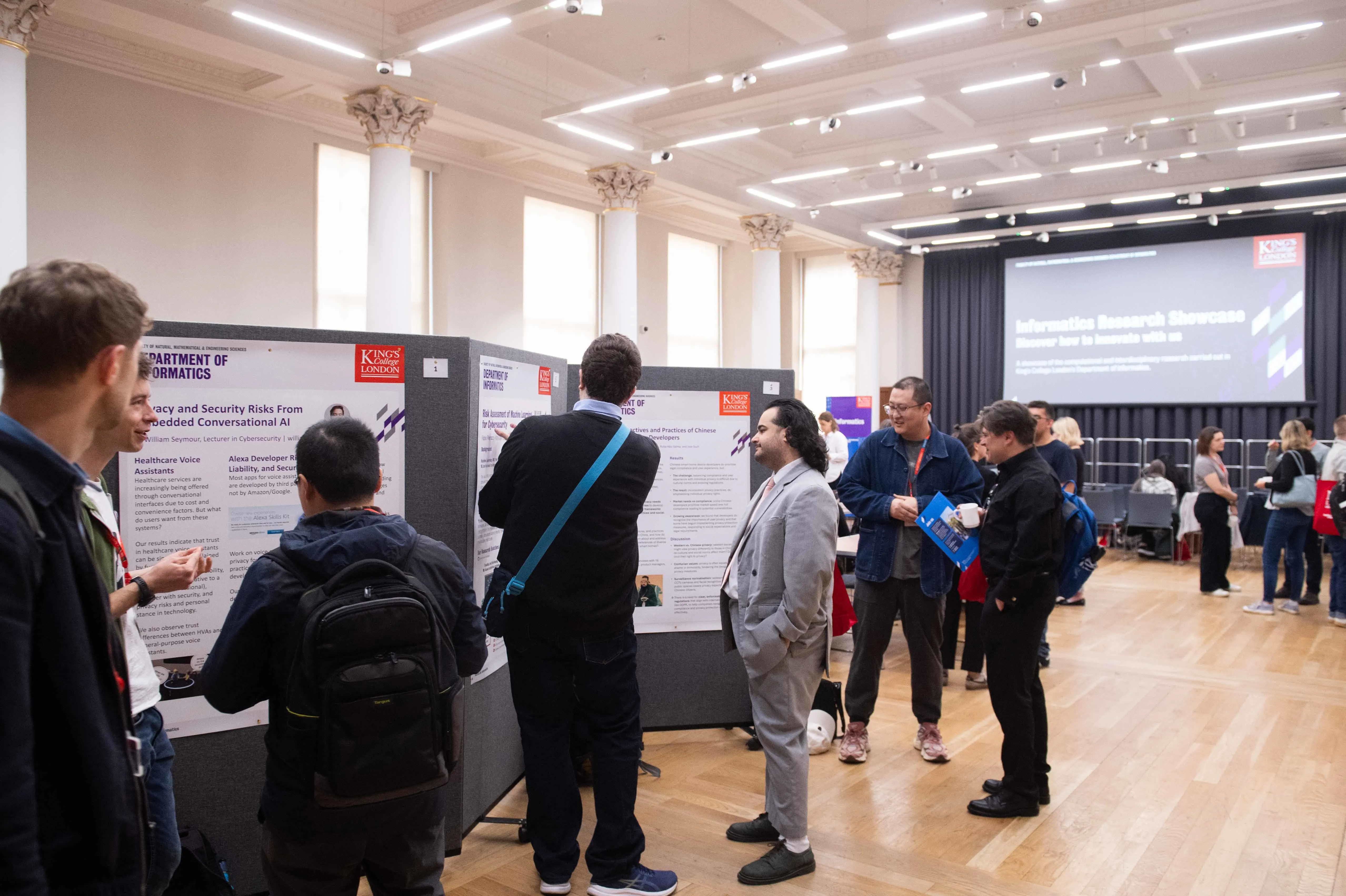 A hall displaying posters in the middle