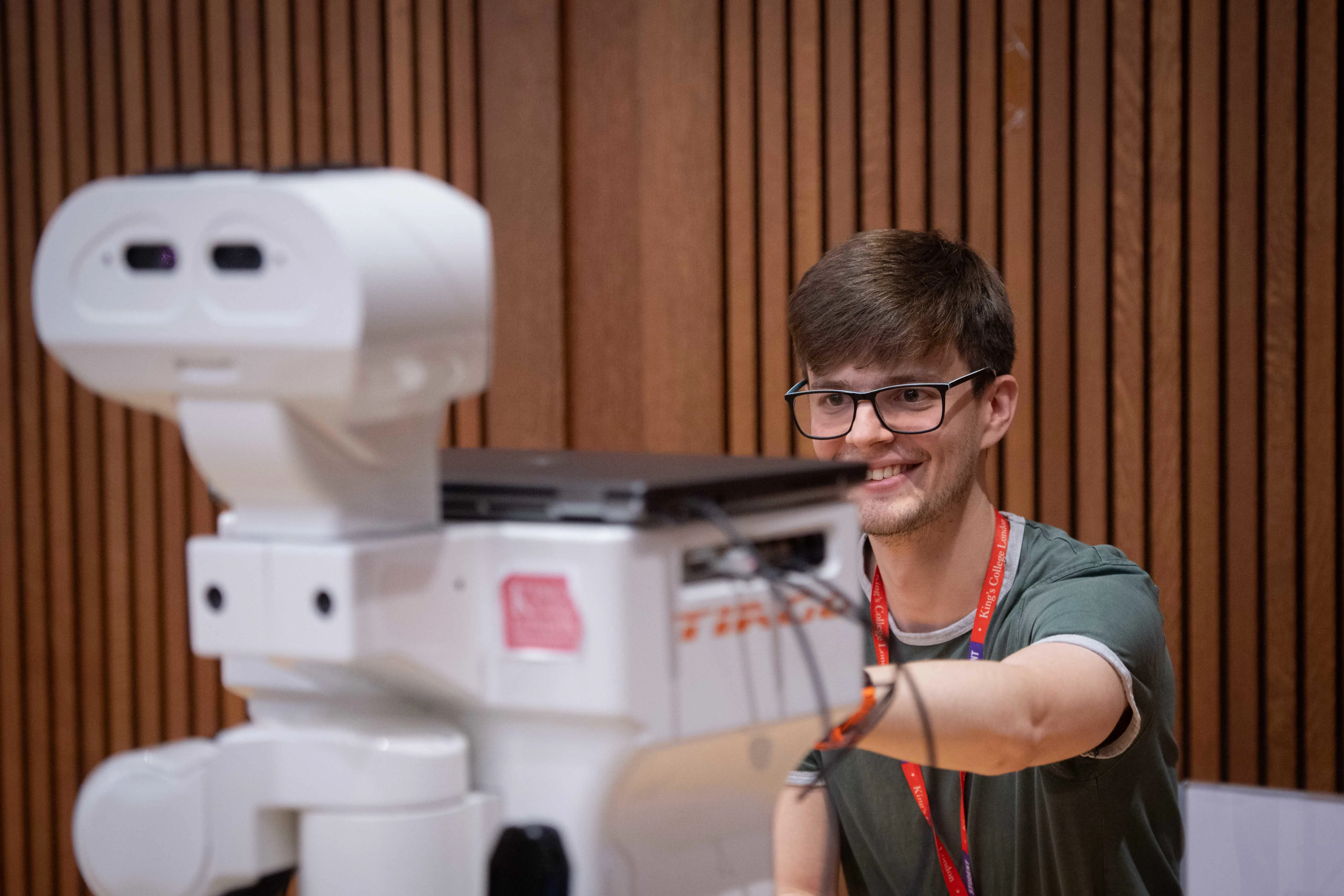 A student interacting with a robot