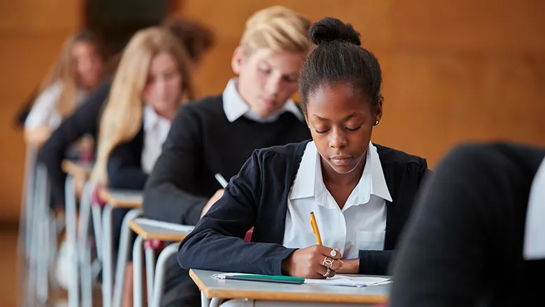 school pupils taking an exam