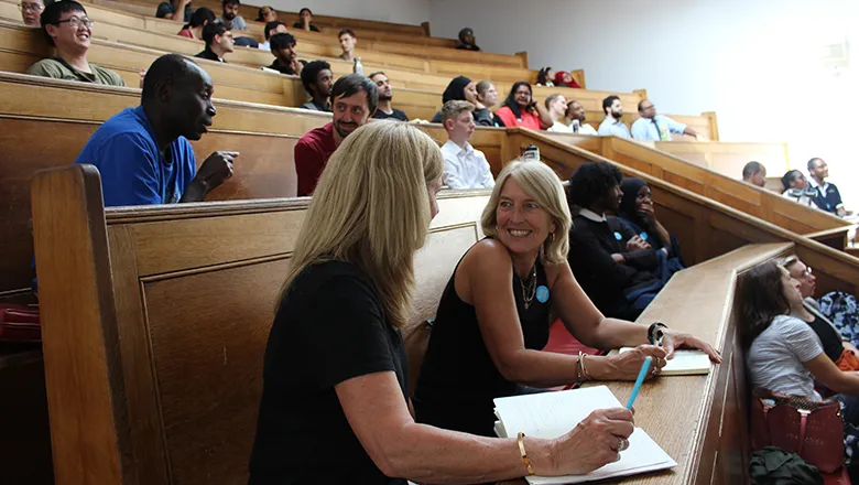 teachers in an auditorium 