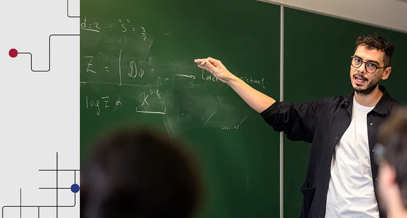 A postgraduate research explains an equation written on a chalk board. The Martingale Foundation abstract design, a series of lines and circles, is visible to the left.