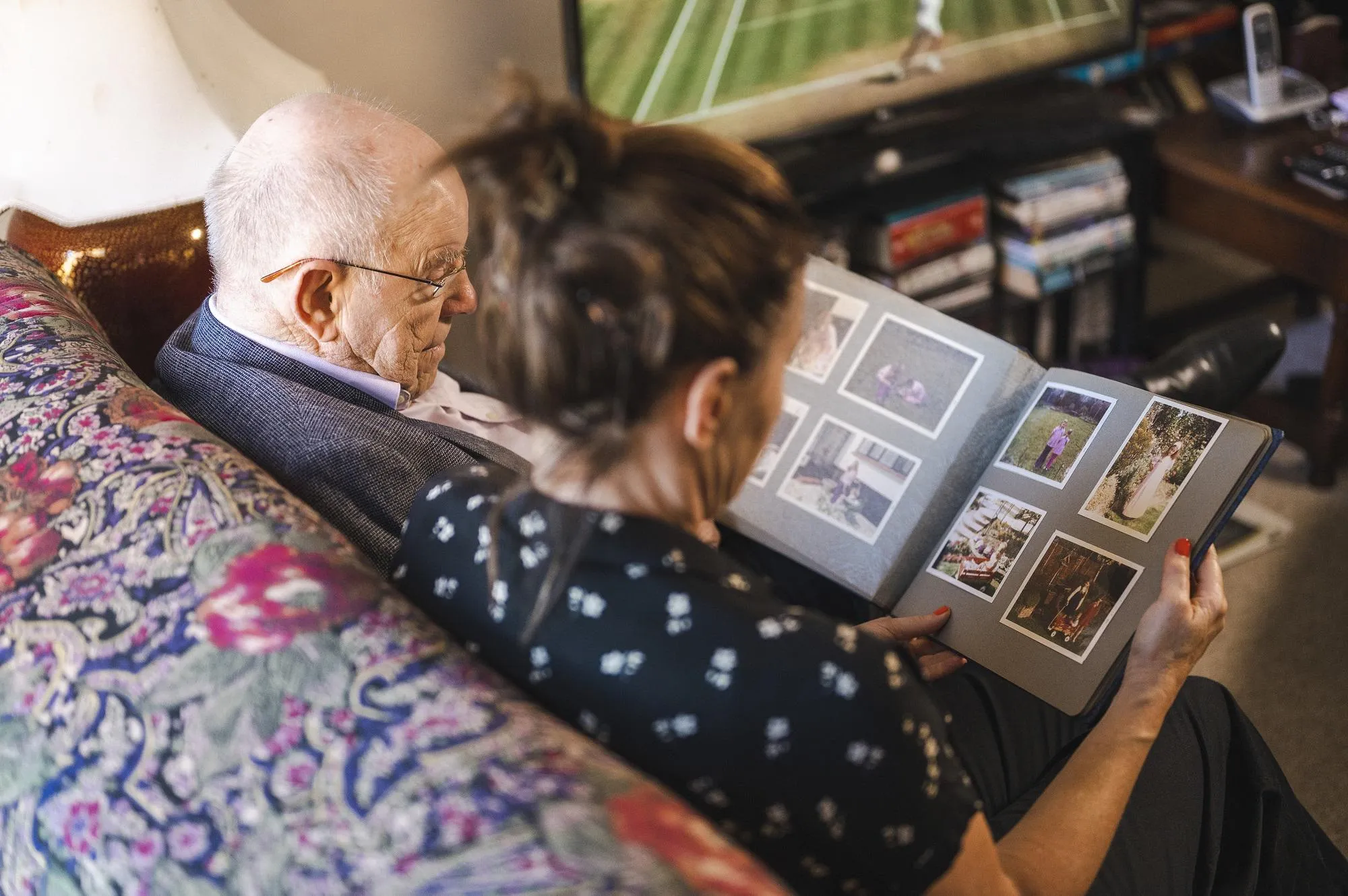 woman caring for older man