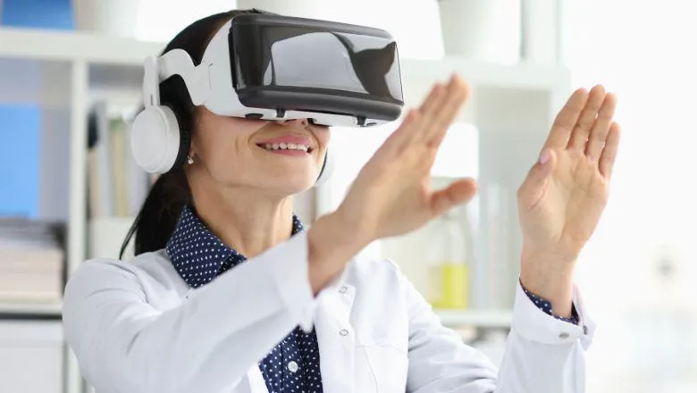 A woman using a virtual reality headset