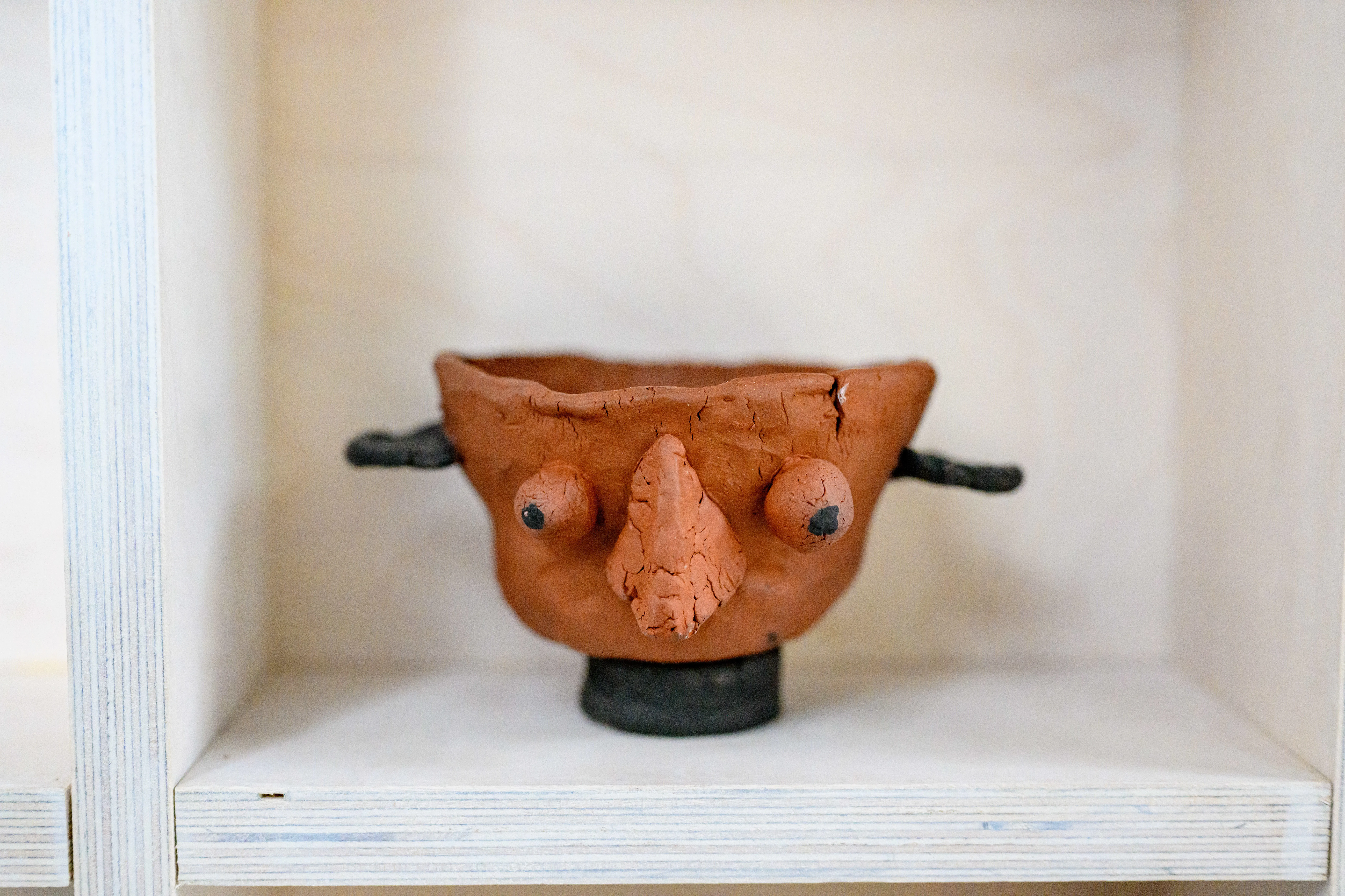 A clay pot made by students