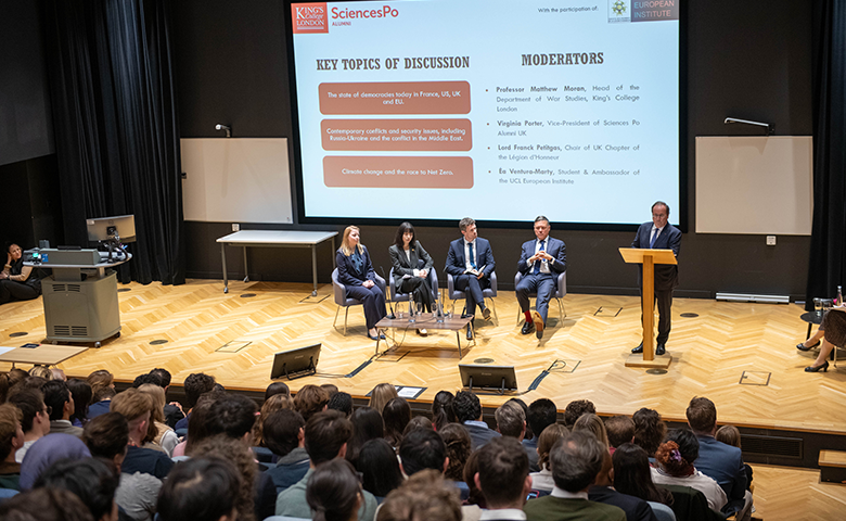 President François Hollande speaks to audience in a lecture theatre