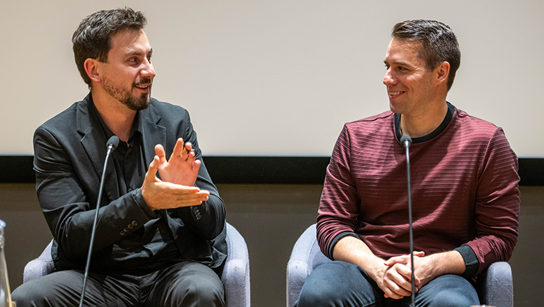 Close-up of Sergiy Ivanchuk and Ryan Smith during panel discussion.