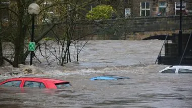Three cars are under the water from floors in the UK.