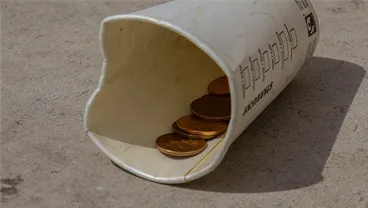 coffee cup and coins