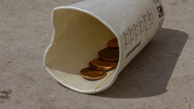 coffee cup and coins