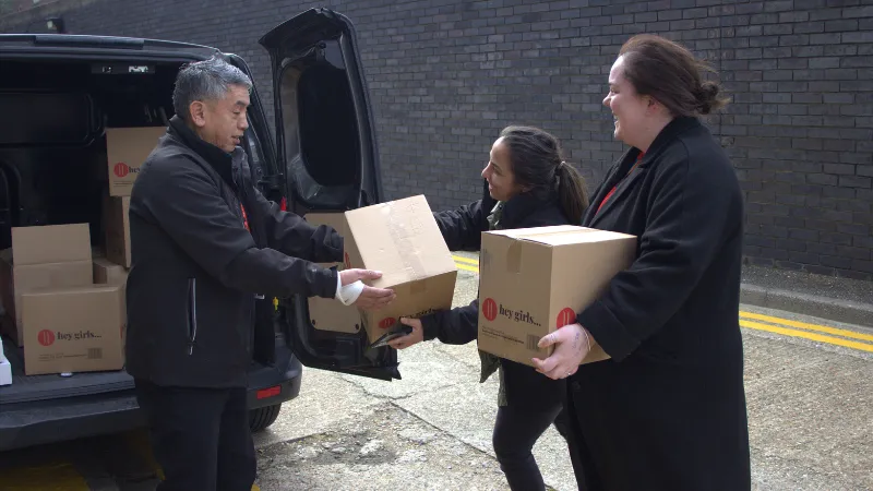 King’s staff unloading the first delivery from Hey Girls.